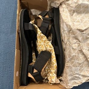 Black suede Tevas. New in box. Men’s 7, women’s 9.